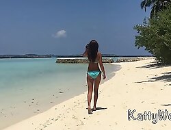 Tanned Katty West in the Maldives